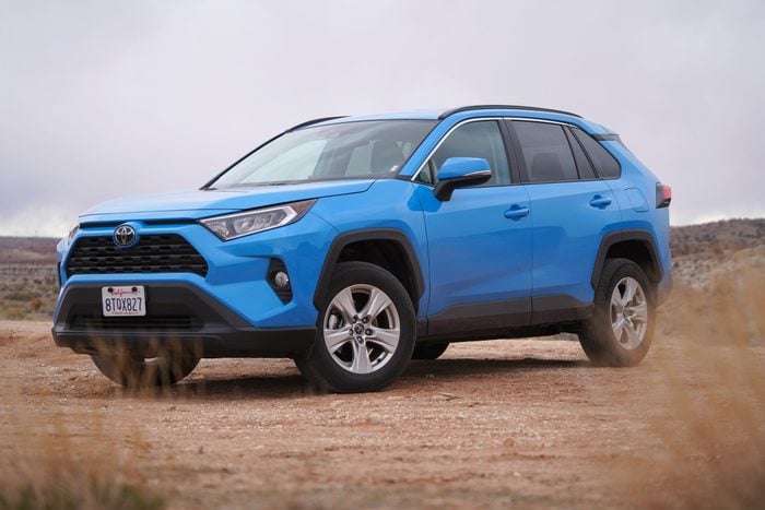 Blue Toyota RAV4 On Dirt Road In Utah Wilderness