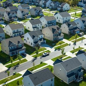 Numerous Suburban Tract Houses on a sunny day in fall.
